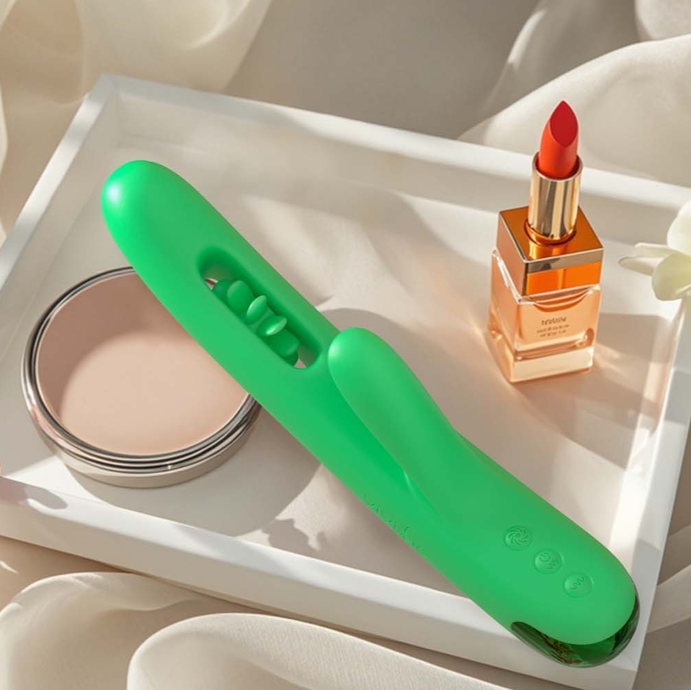 Hands adjusting a compact vibrator before partnered use