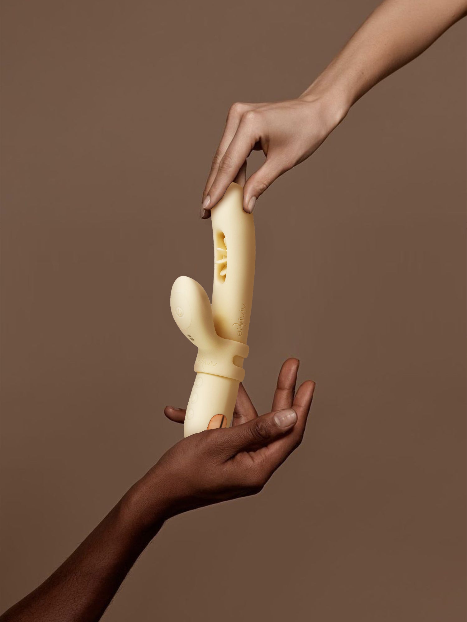 Couple holding VIVIFIE VELORA Rabbit sex toy together